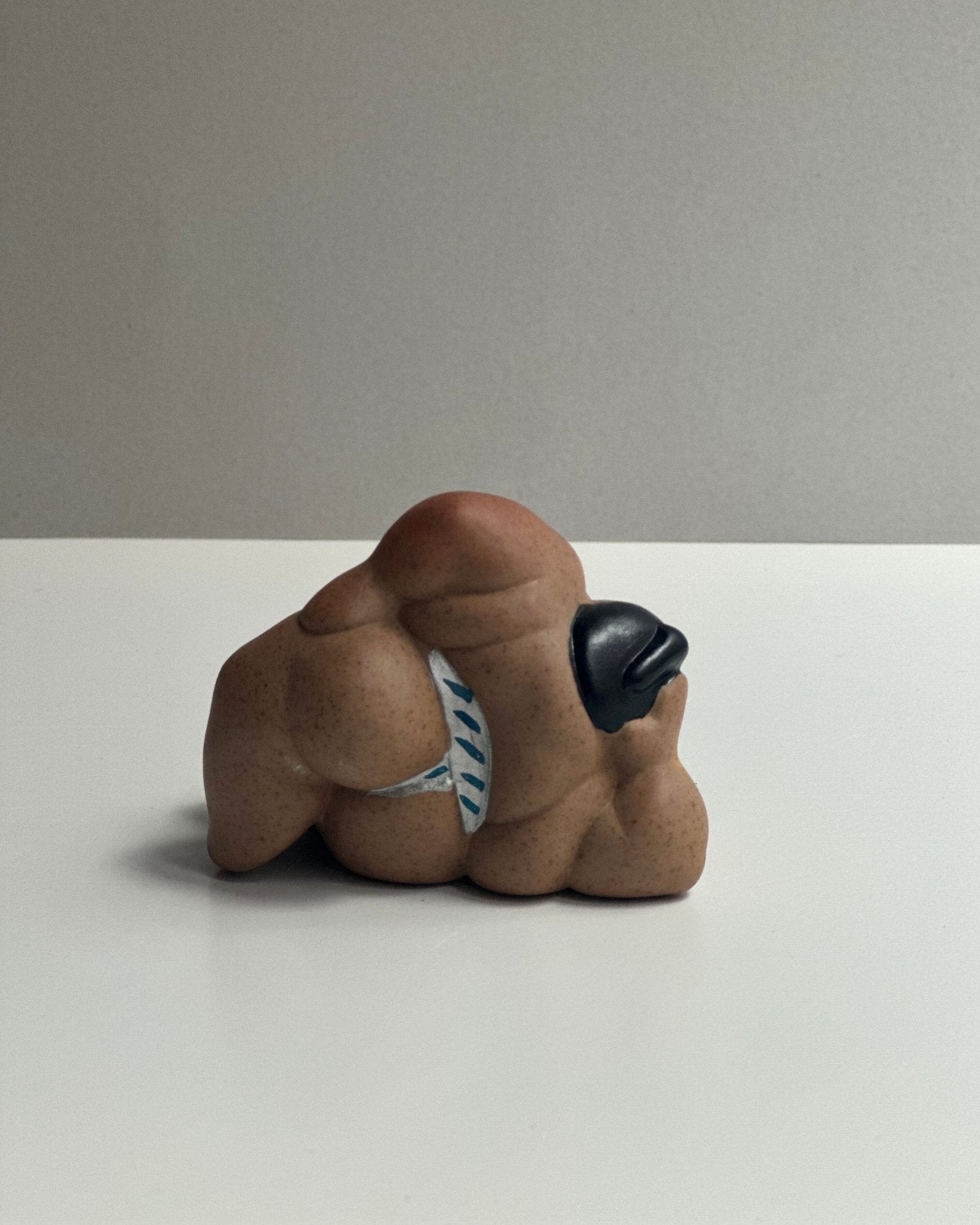 Ceramic Sumo Fighter Figurines - On side - OHAYŌ